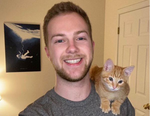 A little orange cat who was about to be euthanized met a man who had wanted to raise a cat since he was a child